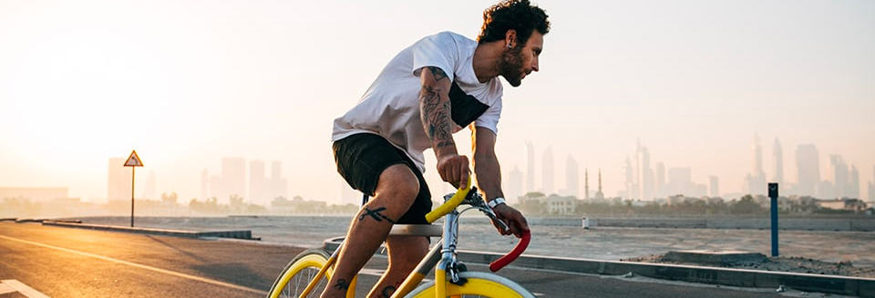 young man riding bike